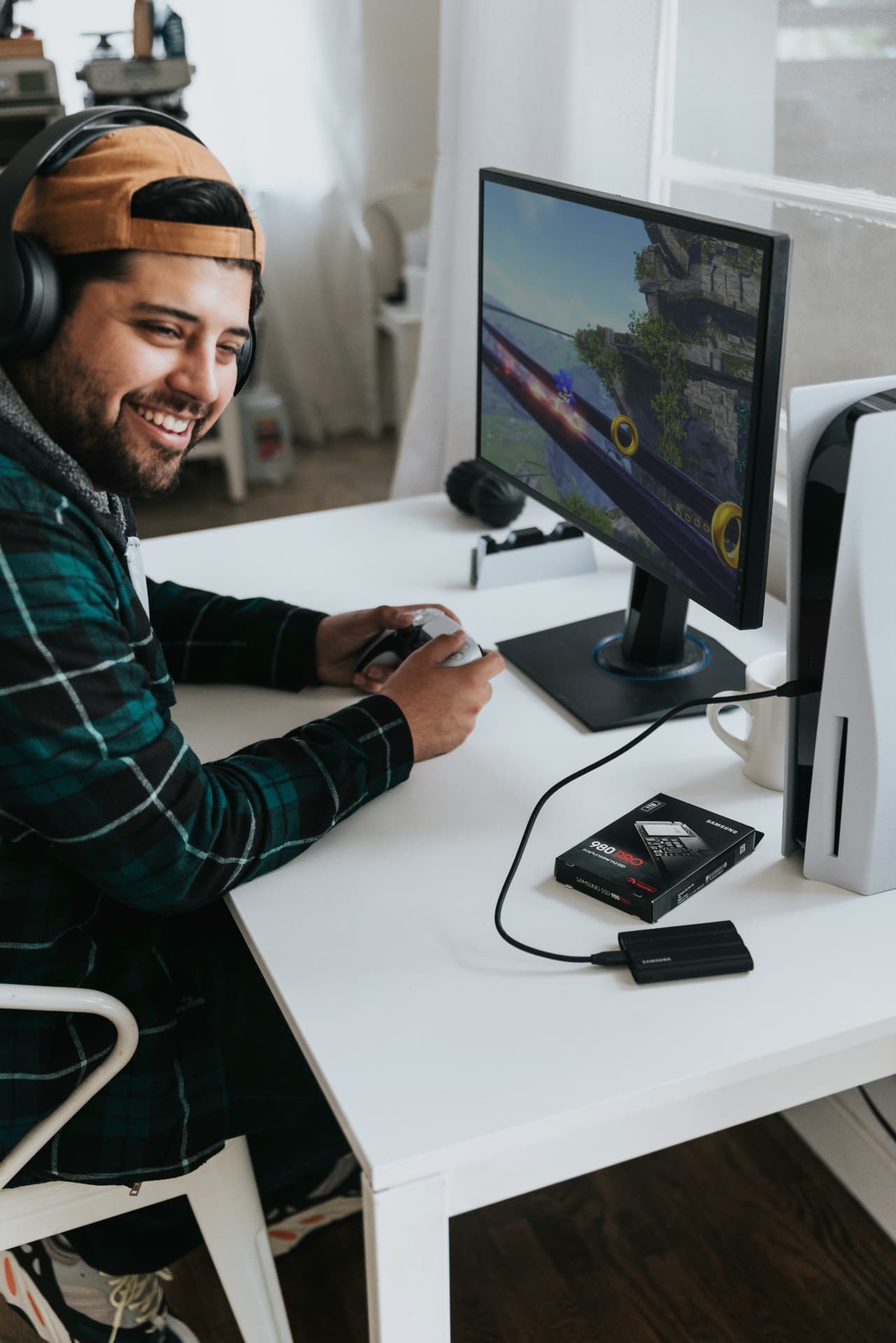 A young man gaming at his computer